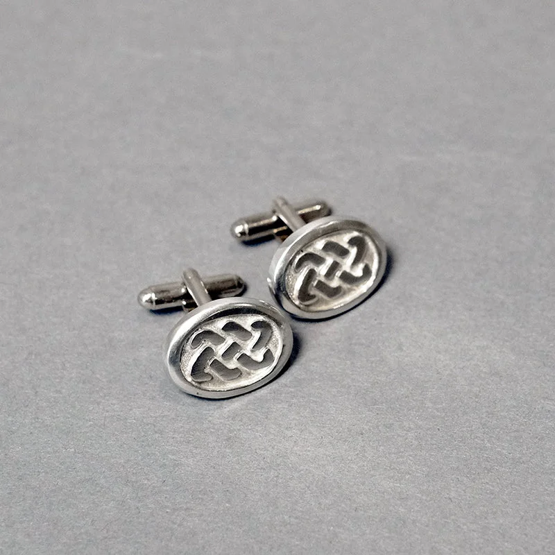 Cufflinks with celestial motifs for a cosmic and mystical fashion statement-Oval Pewter Cufflinks with Celtic Design