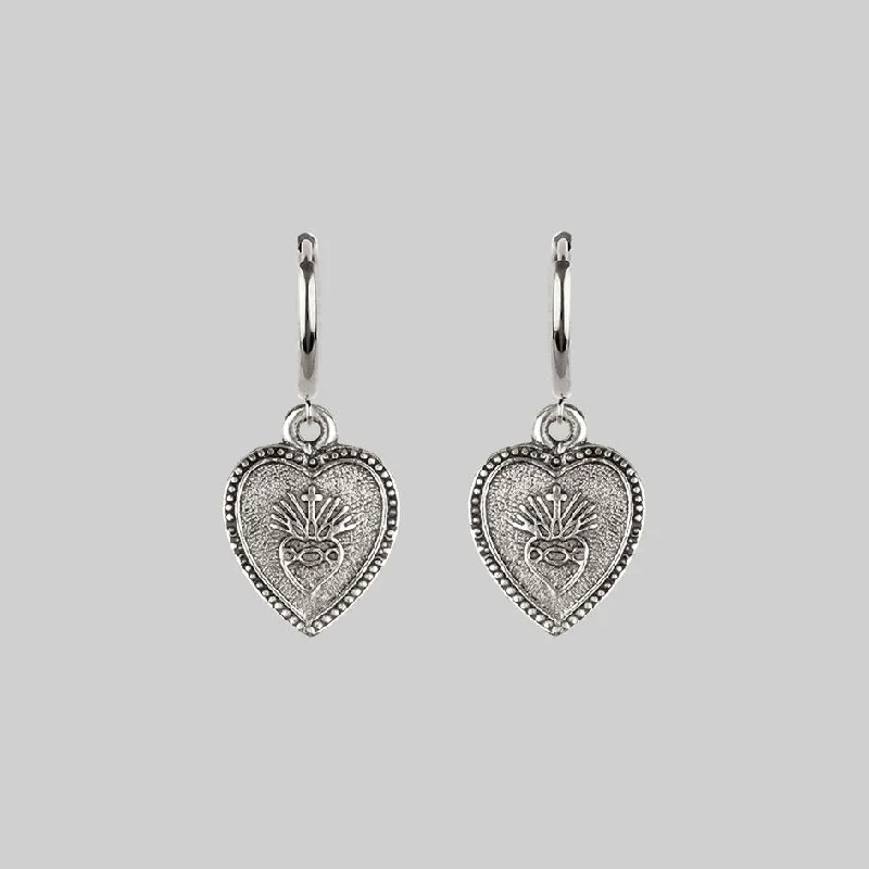 Medium hoop earrings for an everyday look with the perfect balance of style-ARDOUR. Sacred Heart Hoop Earrings - Silver