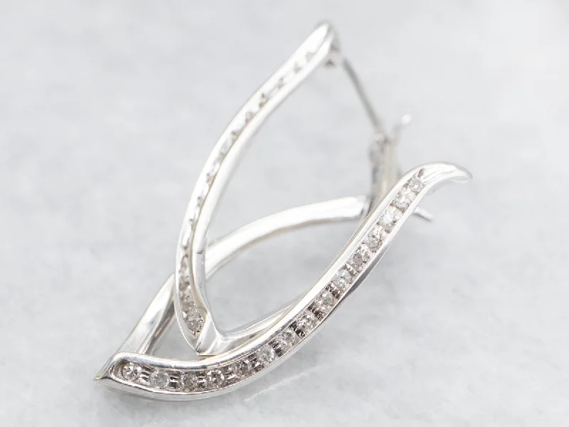 Best hoop earrings with geometric cuts for a sharp, modern appeal-Twisted Gold Diamond Hoop Earrings