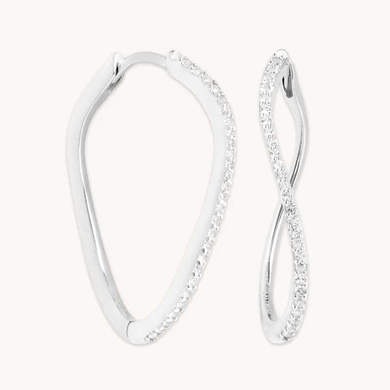 Hoop earrings with leather accents for a sleek and bold combination-Infinite Topaz Pavé Hoops in Solid White Gold