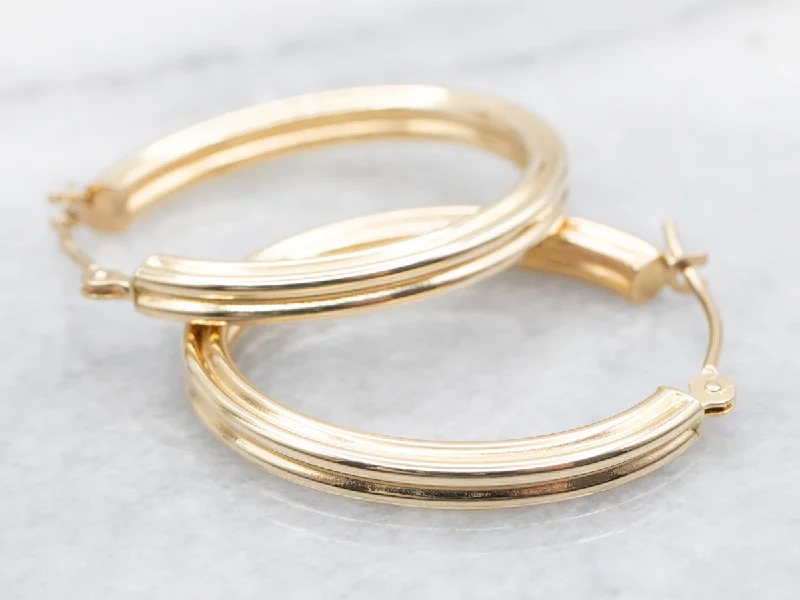 Stylish hoop earrings with diamond accents for an elegant and sparkling effect-Lined Oval Hoop Earrings