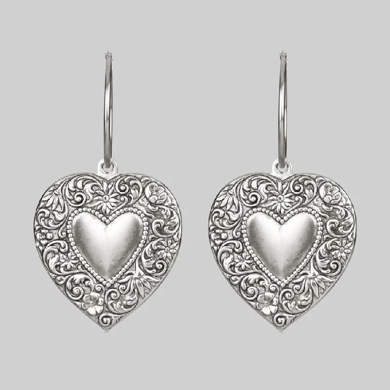 Hoop earrings with artistic filigree designs for an intricate, delicate finish-LOVE STRUCK. Heart Hoop Earrings - Silver