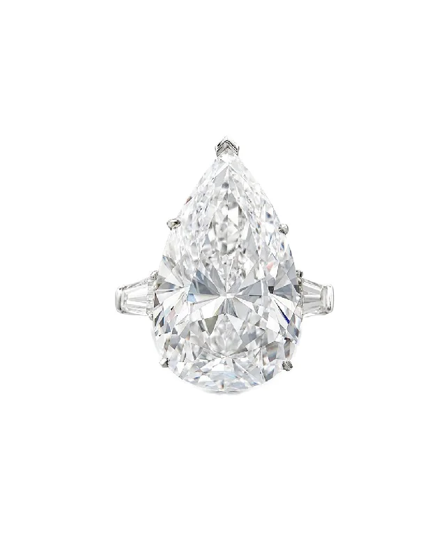 Rings with floral halo diamond arrangements -7 Carat Pear Shape G Color Vs1