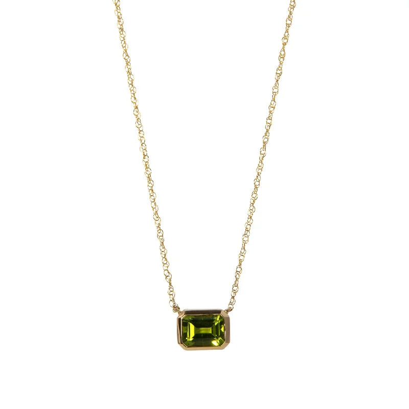 Best necklaces and pendants with minimalist pendants for a sleek, understated look-Emerald-Cut Peridot Bezel Set 14K Yellow Gold Necklace