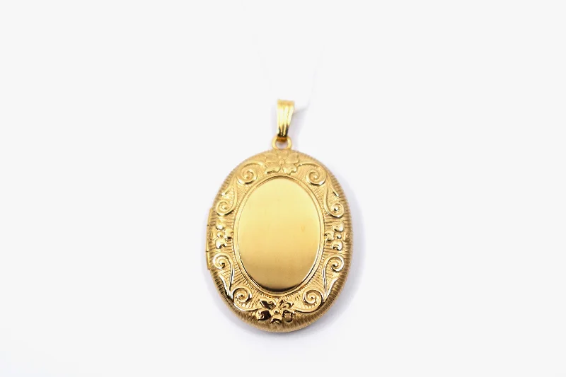 Necklaces and pendants with crescent moon designs for a celestial and mystical feel-Yellow Gold Engraved Oval Locket