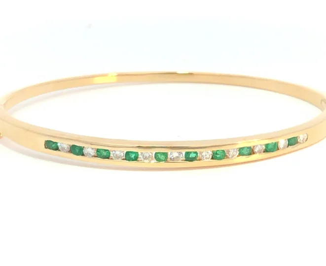 Wide bangle bracelets with boho-inspired patterns for a free-spirited design-14Y Channel Set Round Emerald and Diamond Hinged Bangle