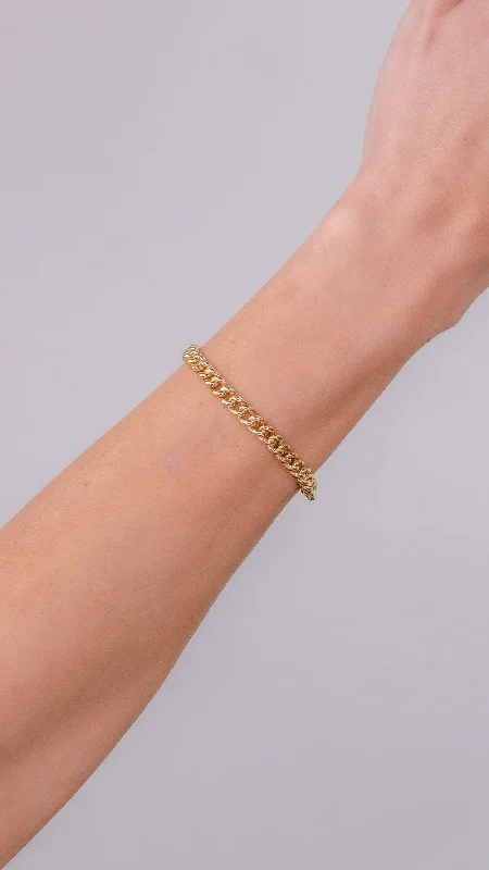 Stackable bangle bracelets with customizable charms for a personalized collection-5.5mm 14k Yellow Gold Bubble Cuban Bracelet