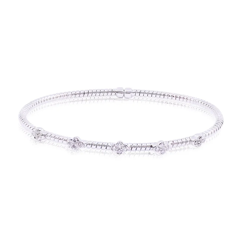 Chunky bangle bracelets with metallic finishes for a bold and statement-making look-18K WHITE GOLD FLEXIBLE TWISTED WIRE CUFF BRACELET WITH PAVE STATIONS 0.30CTW