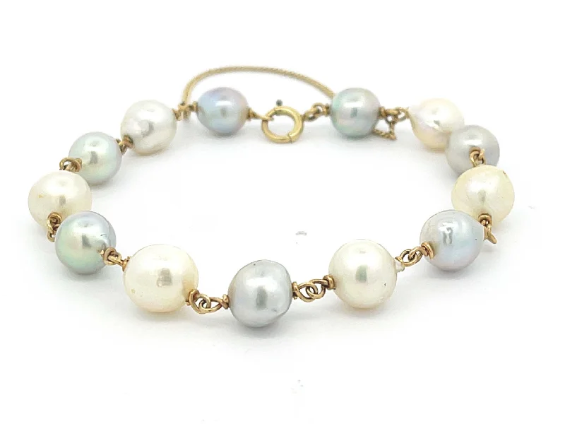 Best bangle bracelets with natural wood for a unique and earthy aesthetic-Baroque Pearl Bracelet in 14k Yellow Gold