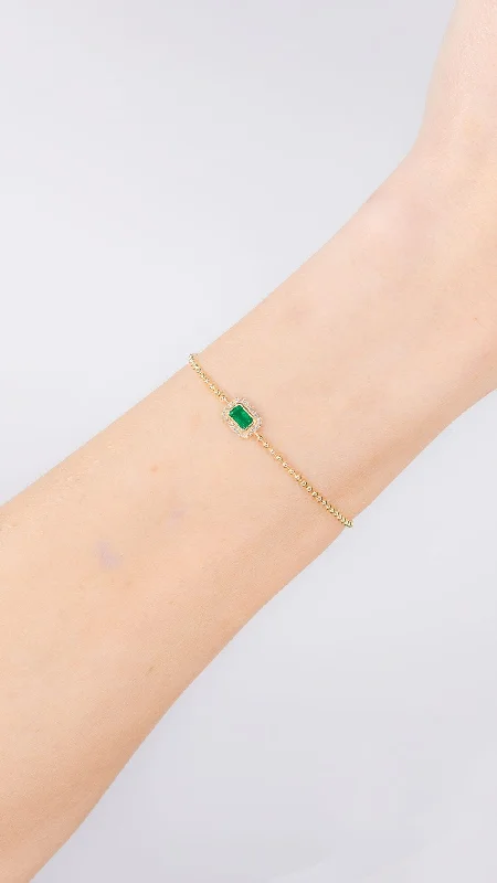 Bangle bracelets with colorful gemstone accents for a fun and vibrant pop of color-Beaded Halo Bezel Emerald Bracelet