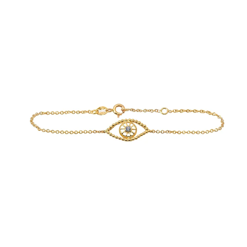 Bold bangle bracelets with textured finishes for a dynamic and modern style-Gold and Sapphire Evil Eye Bracelet