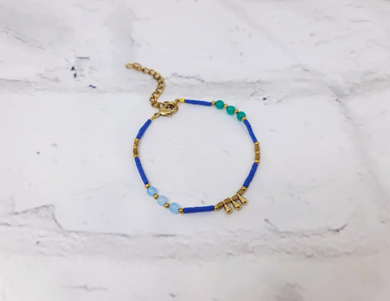 Simple bangle bracelets with smooth matte finishes for a subtle and modern style-Blue & Gold Droplet Bracelet