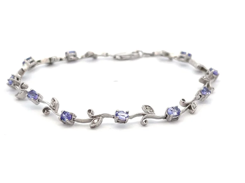 Best silver bangle bracelets with intricate detailing for a timeless and sophisticated style-Tanzanite Diamond Leaf Bracelet in 14k White Gold