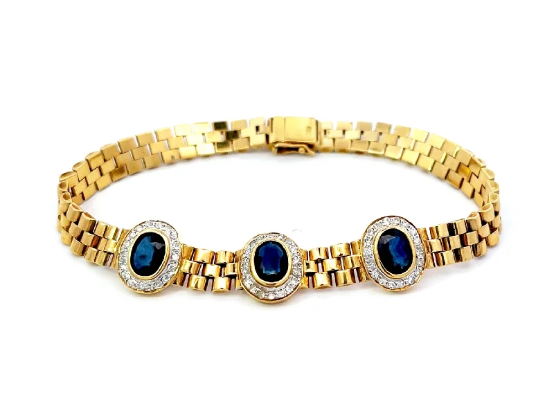 Wide bangle bracelets with animal print designs for a bold and exotic look-Three Sapphire Diamond Halo Link Bracelet in 18k Yellow Gold