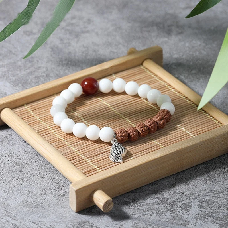 Best bangle bracelets with pastel-colored stones for a soft and delicate appearance-White Jade River Of Healing Bracelet